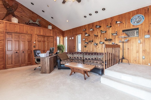 interior space with high vaulted ceiling, wood walls, a ceiling fan, and a wall mounted AC