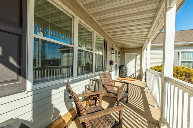 balcony featuring a porch