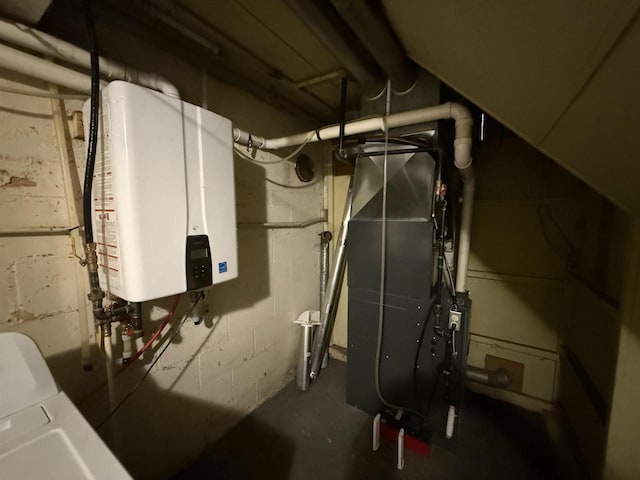 utilities with tankless water heater and washer / clothes dryer