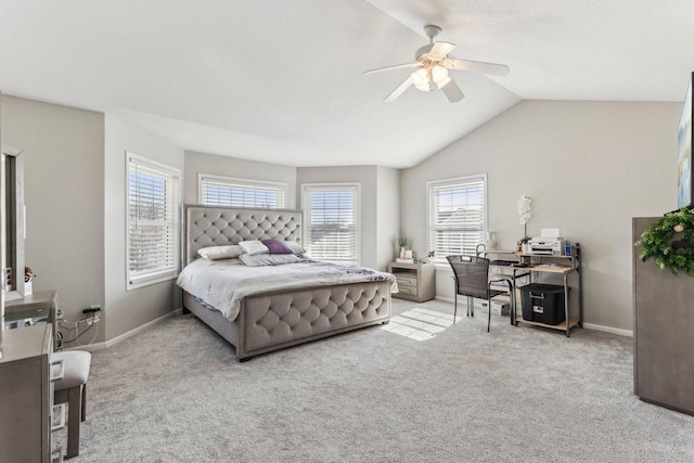 bedroom featuring lofted ceiling, a ceiling fan, baseboards, and carpet floors