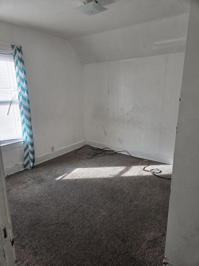 1638 Taylor Ave, Racine, WI 53403 - carpeted spare room featuring baseboards and lofted ceiling