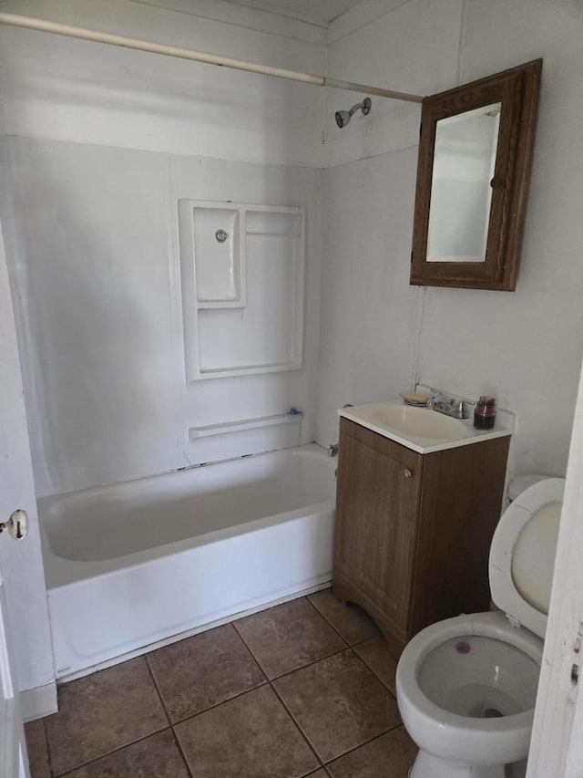 1638 Taylor Ave, Racine, WI 53403 - bathroom featuring vanity, toilet,  shower combination, and tile patterned flooring
