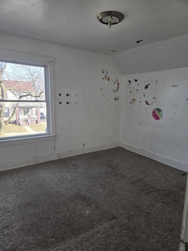 1638 Taylor Ave, Racine, WI 53403 - carpeted empty room featuring baseboards and lofted ceiling