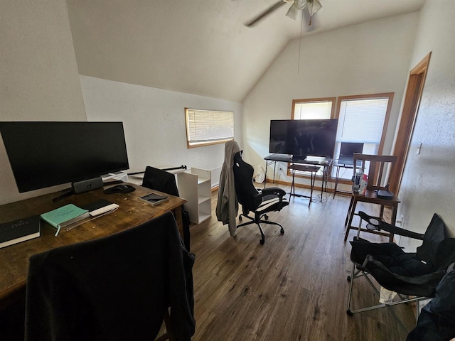 home office featuring a ceiling fan, lofted ceiling, and dark wood-type flooring