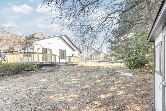 view of yard featuring a deck