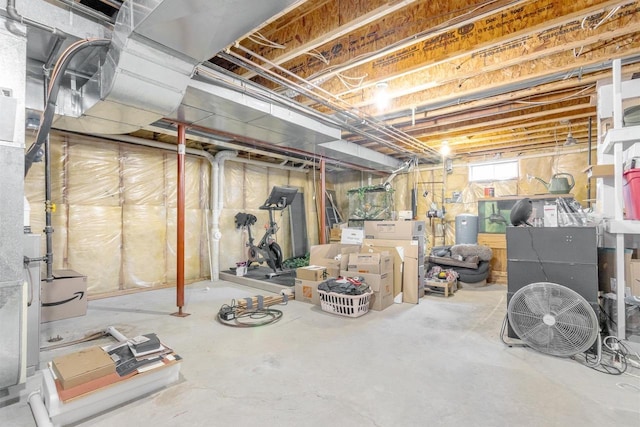 basement featuring washing machine and clothes dryer