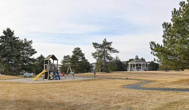 community jungle gym featuring a gazebo and a lawn