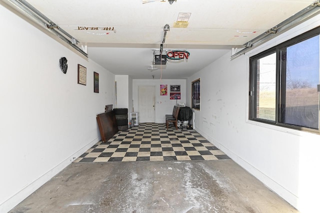 garage featuring baseboards