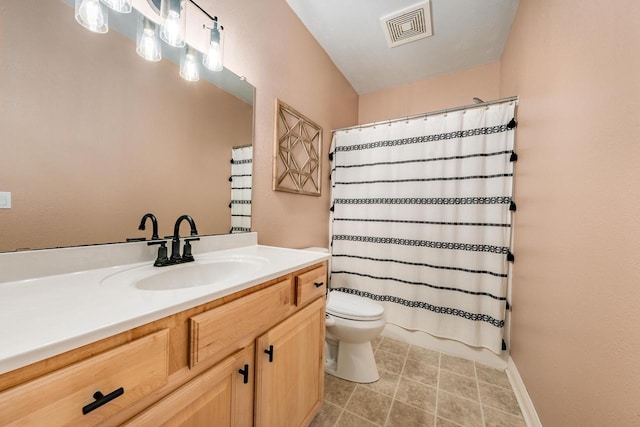 bathroom with visible vents, toilet, vanity, and a shower with curtain