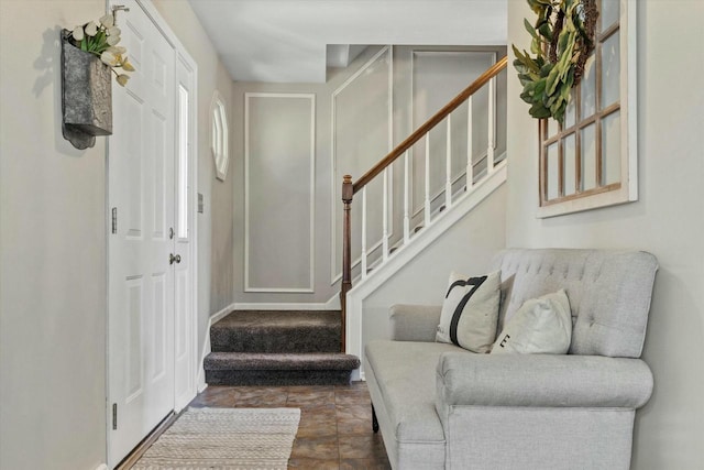 foyer featuring stairs