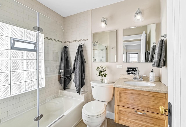 full bathroom with shower / bath combination, toilet, and vanity