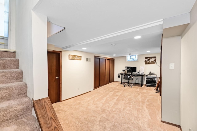 home office with recessed lighting, light colored carpet, and baseboards