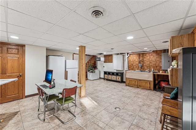 dining space with recessed lighting, baseboards, visible vents, and a paneled ceiling