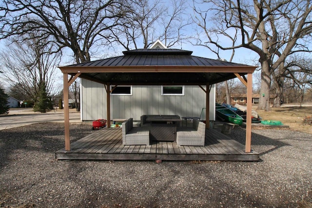 view of patio / terrace featuring a gazebo and a wooden deck