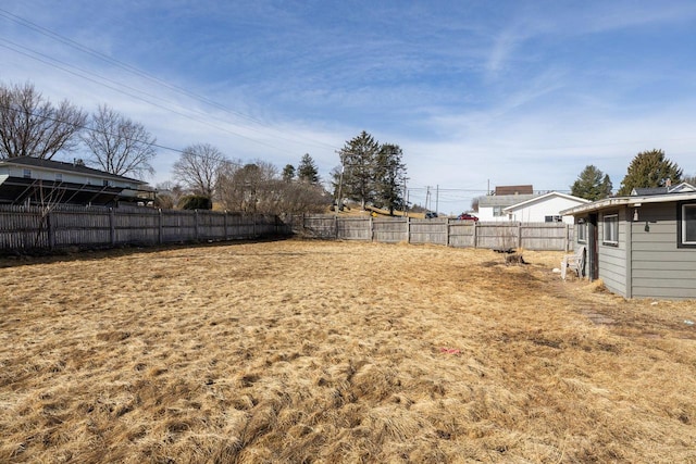 view of yard featuring a fenced backyard