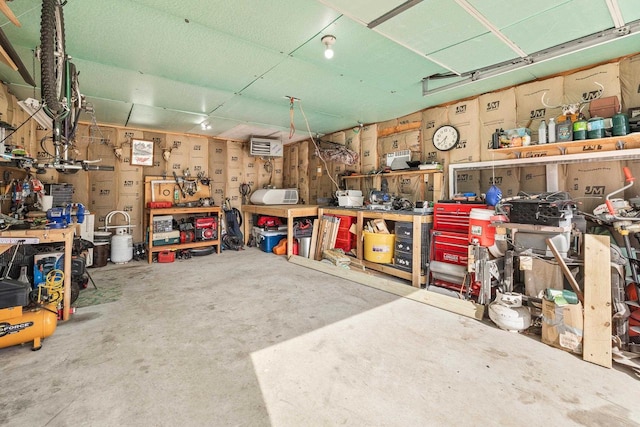 garage with a workshop area