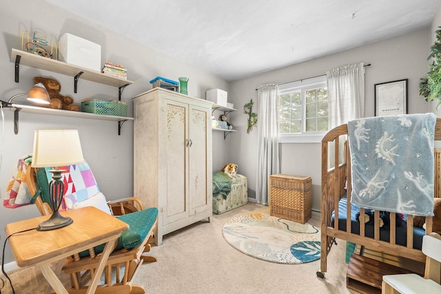 bedroom featuring light carpet