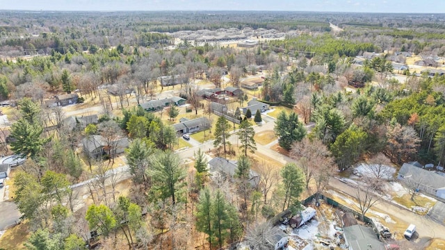 aerial view with a wooded view