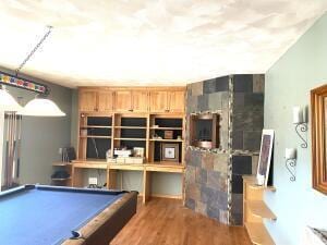 rec room with pool table and wood finished floors