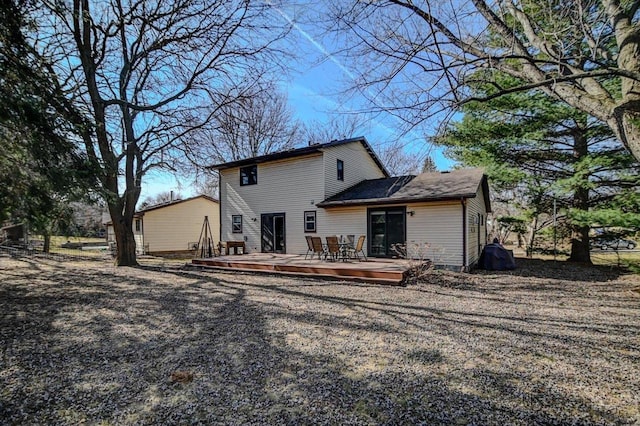 rear view of house with a deck