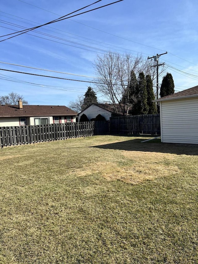 view of yard with fence