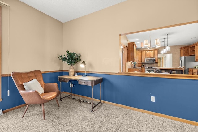 sitting room with visible vents, baseboards, and carpet