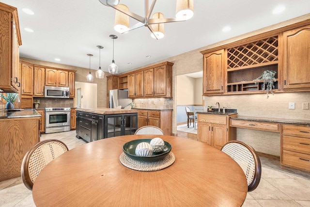 dining area with light tile patterned floors and recessed lighting