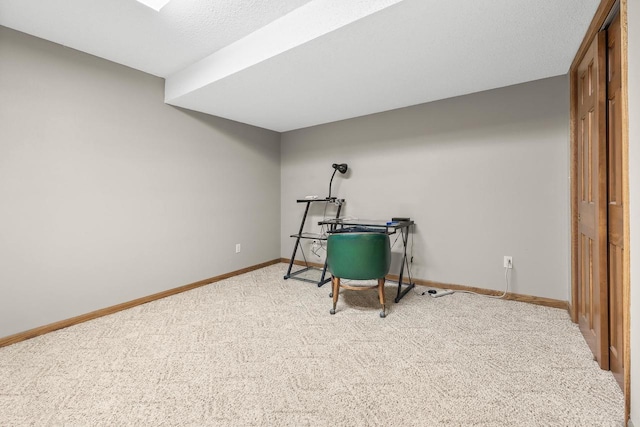 interior space with carpet flooring and baseboards