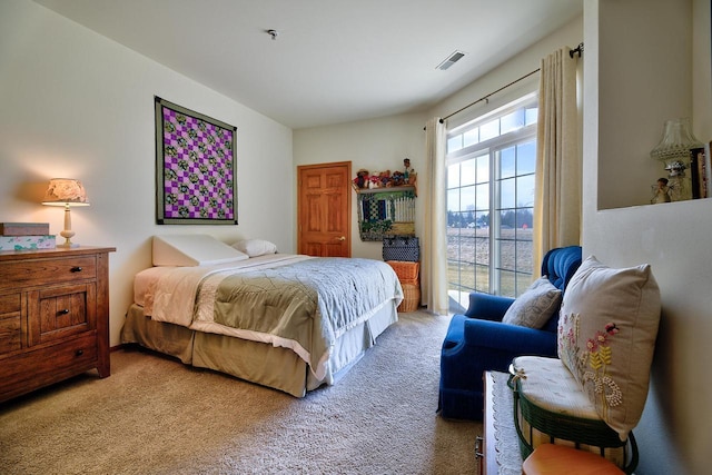 carpeted bedroom with visible vents