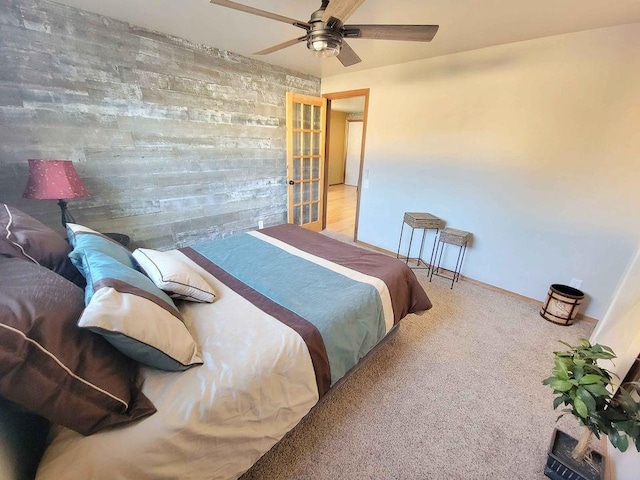 bedroom with carpet flooring, ceiling fan, and baseboards