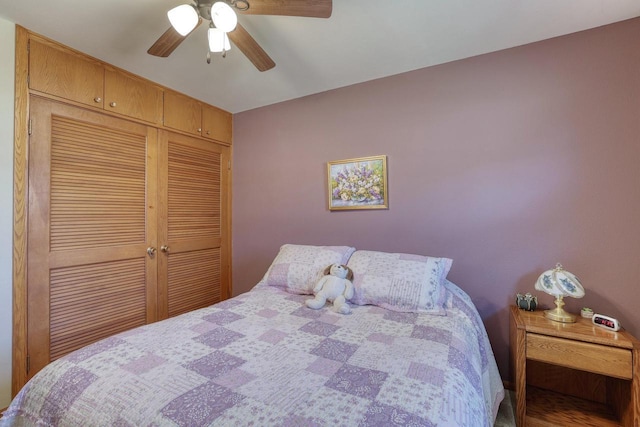 bedroom featuring a closet and a ceiling fan