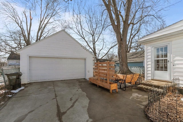 detached garage with fence