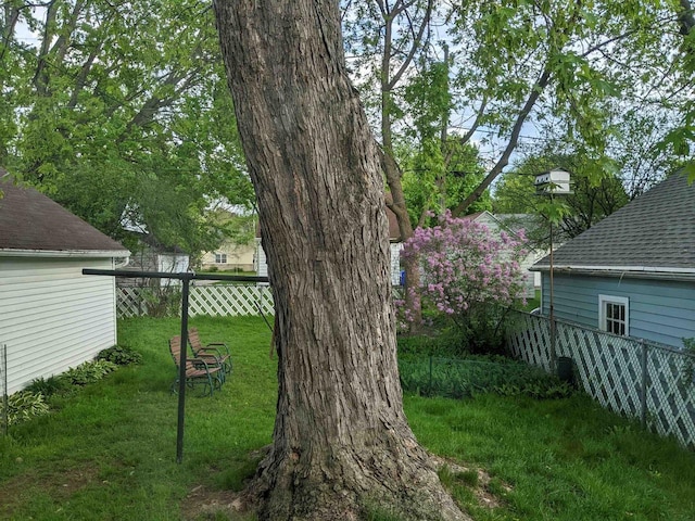 view of yard with fence