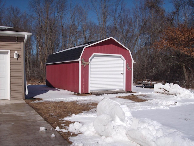 view of snow covered garage