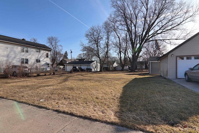 view of yard featuring a garage