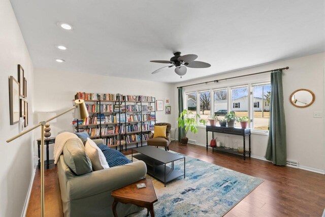 sitting room with visible vents, wood finished floors, recessed lighting, baseboards, and ceiling fan