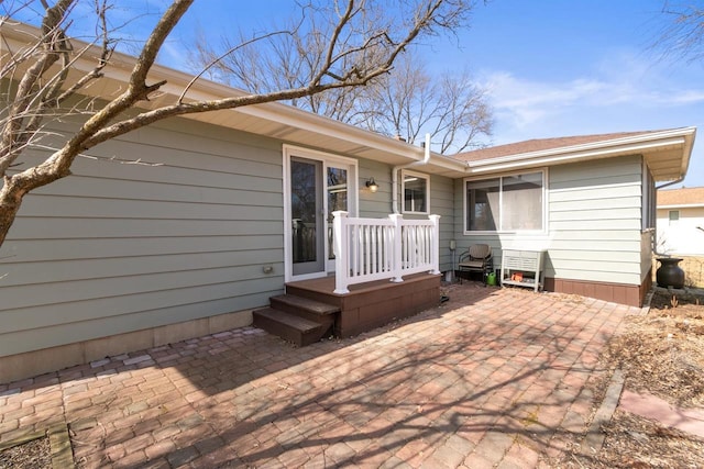 back of property featuring a patio area