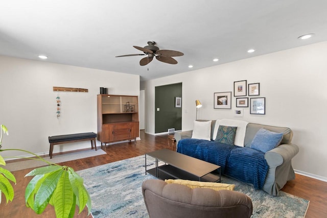 living room featuring recessed lighting and wood finished floors