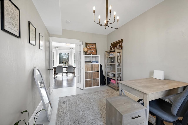 office featuring a chandelier and french doors