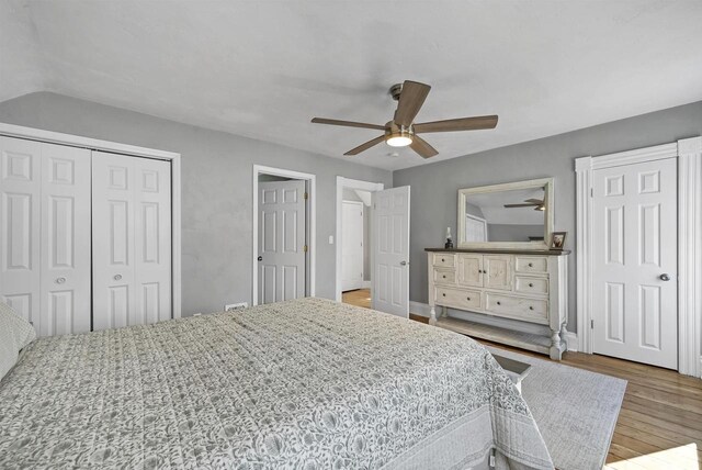 bedroom featuring wood finished floors and a ceiling fan