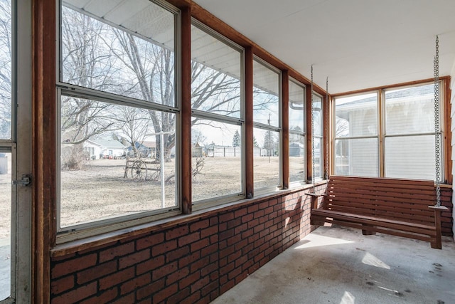 unfurnished sunroom with a healthy amount of sunlight