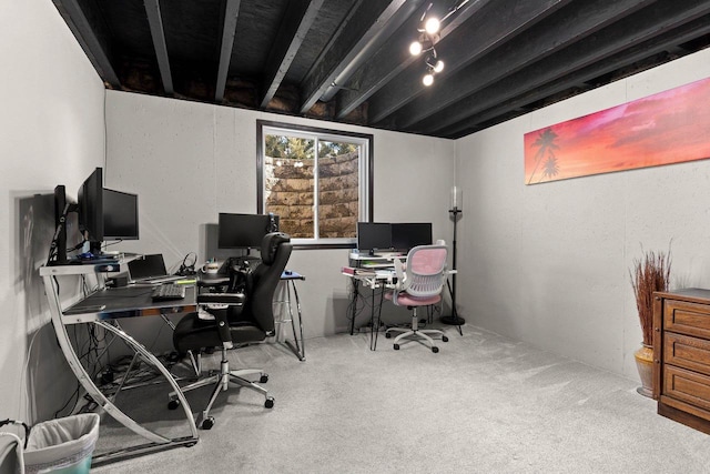 office space featuring beamed ceiling and carpet floors