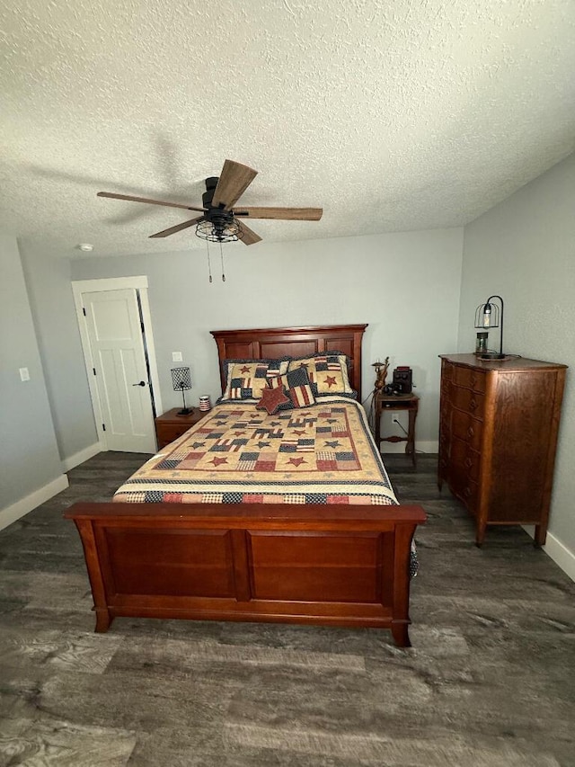 bedroom with baseboards, a textured ceiling, and a ceiling fan