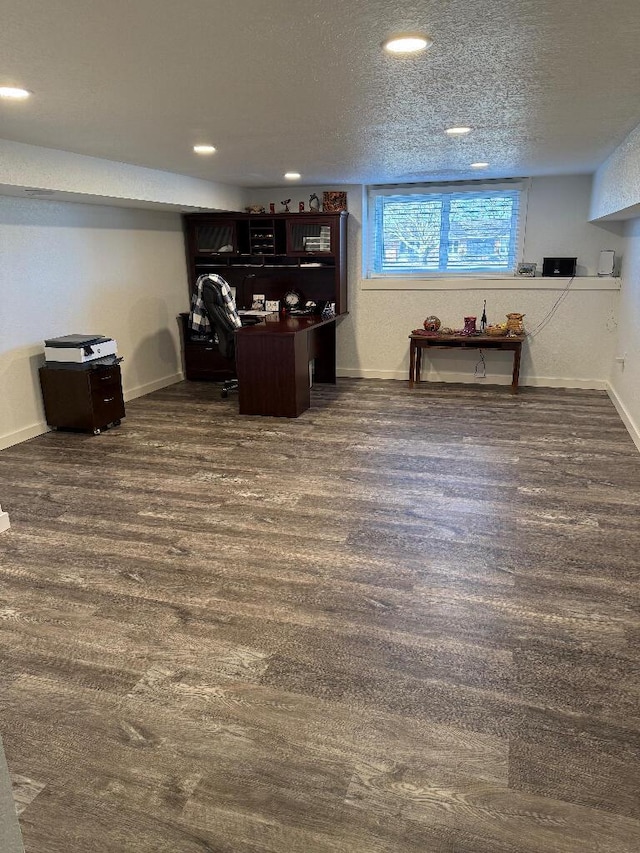 office area featuring dark wood finished floors, recessed lighting, a textured ceiling, and baseboards