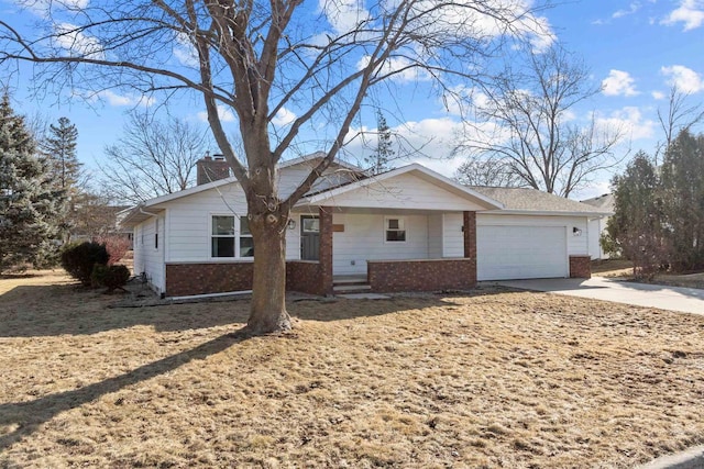 single story home featuring brick siding, driveway, a chimney, and an attached garage