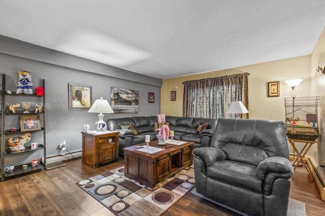 living area with a baseboard heating unit and wood finished floors