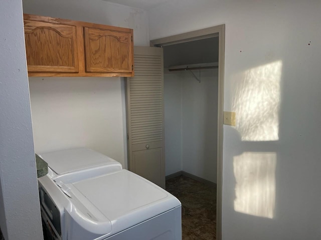 laundry area with cabinet space and washing machine and dryer