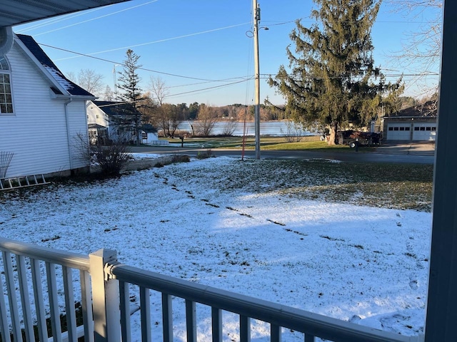 view of yard layered in snow