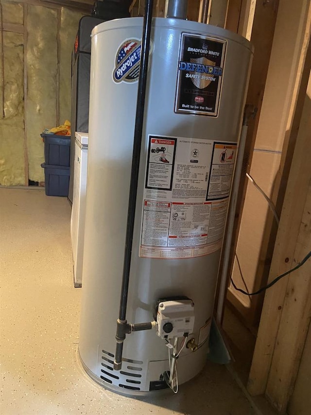 utility room featuring water heater