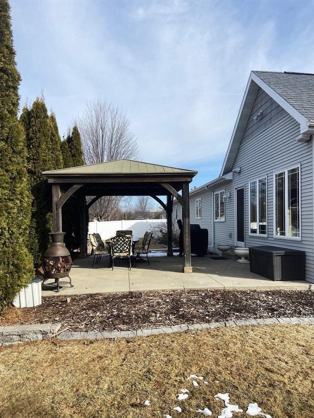 view of yard featuring a gazebo, a patio area, and fence